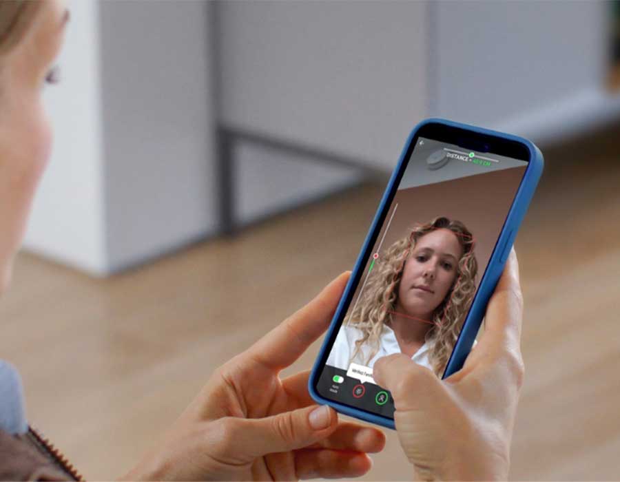 A consumer using the interface of a photo app during a consumer study.